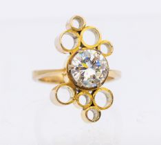 A 9ct gold dress ring set with a round brilliant cut cubic zirconia, claw set within a border of