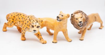 Three John Beswick figures, lion, lioness and a leopard.