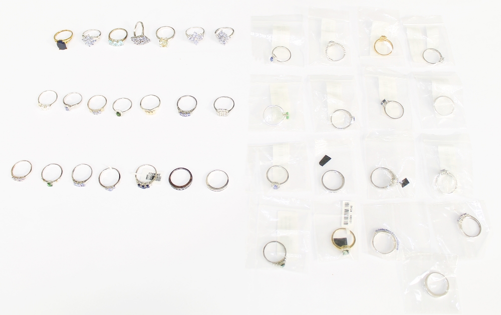 A collection of 38 silver to include various stone set rings, including stones such as tanzanite, (