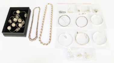 A collection of silver jewellery to include two stone set hinged  bangles one set with ruby the