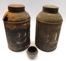 Two early 20th century tea cannister/caddy tins and a small metal bowl/dish. Some loss, holes and