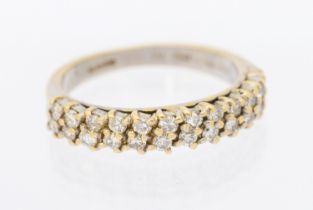 A bi colour 18ct gold two row half hoop diamond ring, each row comprising 12 brilliant cut