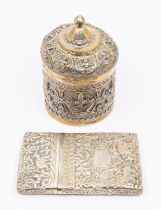 An early 20th century Indian/Burmese unmarked white metal card case, having repousse foliage, floral