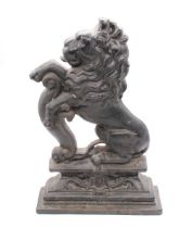 Late 19th Century cast iron lion door stop.