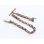 A 9ct gold faceted Albert chain, width of links approx 7mm, with T bar (marked 9c) and swivel