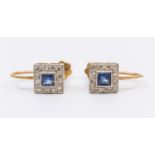 A  pair of diamond and sapphire set 9ct gold earrings, comprising a square mount ste to the centre