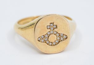 A Vivienne Westwood silver gilt and cubic zirconia set ring, comprising a signet mount with oval