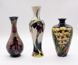Moorcroft Pottery: A 6" vase in Fuchsia, designed by Rachel Bishop for M.C.C. 1993; a 6" Wisteria