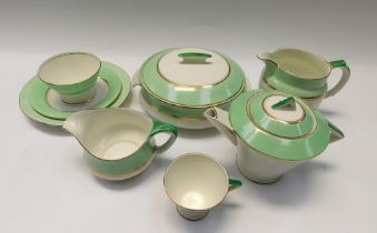 Palissy - A 20th century green and gold banded Art Deco dinner service, to include tea set,