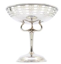 A George V silver  tazza, reticulated bowl above central support with three branch arch supports