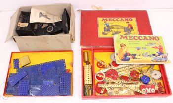 Meccano: A boxed Meccano Set No. 7 with various parts, damaged lid. Together with a boxed No. 2 "