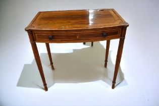 A George III walnut and mahogany single drawer hall table with box wood inlay, slender turned leg