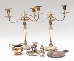 Two silver plated candelabra with fluted stems, candle holder, cream jug, etc. (6)