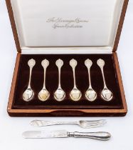 A cased set of six novelty Queen Elizabeth II silver teaspoons titled "The Sovereign Queens Spoon