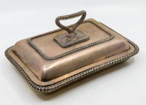 An Edwardian silver rectangular entrée dish, cover and handle, having gadrooned border and handle,