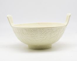 A 19th century Sowerby Queens Ivory pressed glass, twin handled 'New bowl'. Lozenge to base,