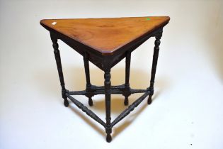 A late Victorian mahogany drop leaf corner occasional table with turned legs.