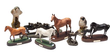 Beswick - A figure of Arkle, a figure of Red Rum (broken off from base), Black Beauty & Foal, a