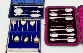 A collection of cased silver spoons to include; a set of six cased Russian silver gilt condiment