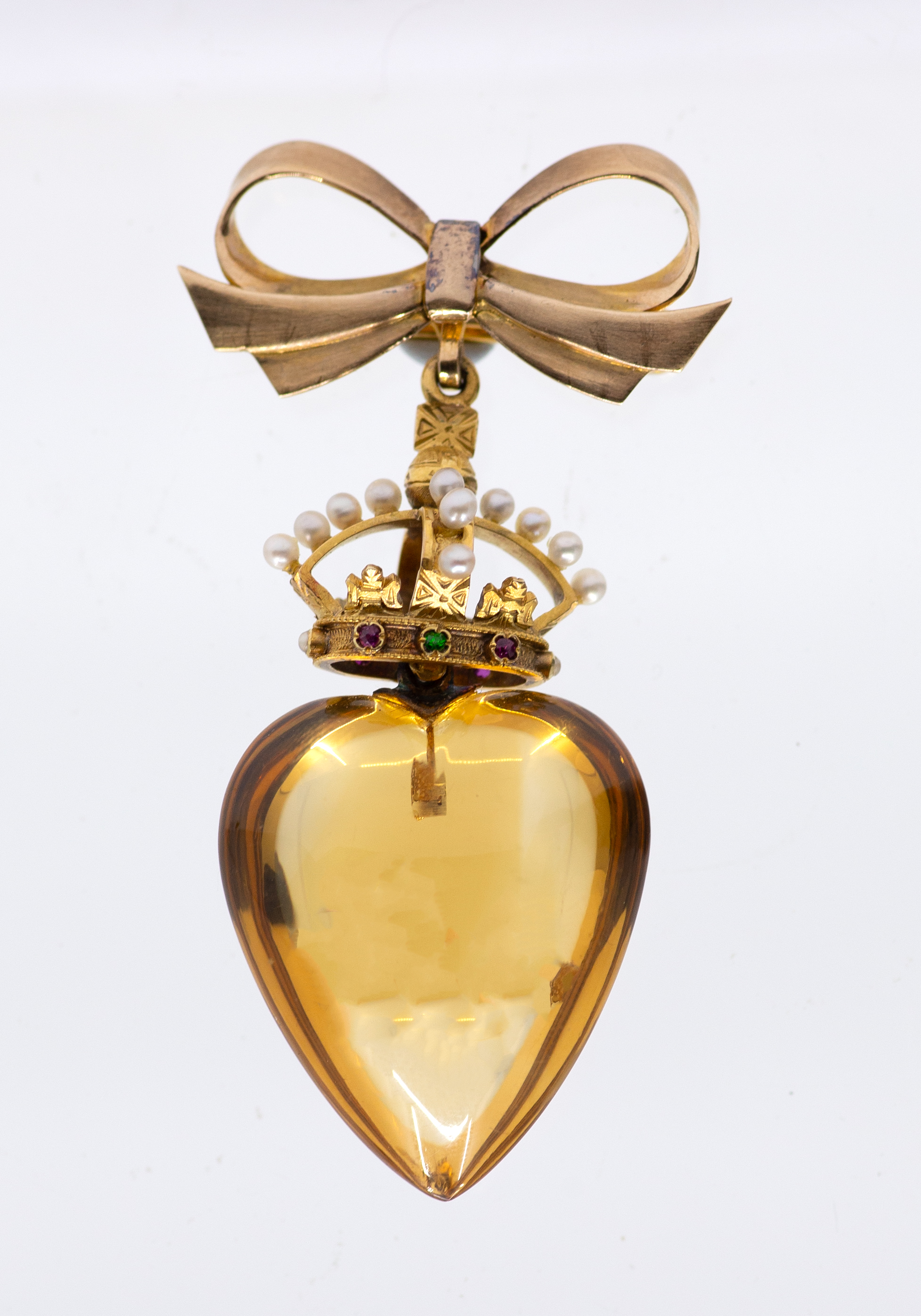 A Victorian heart & crown pendant, comprising a heart shaped citrine approx 28 x 25mm, suspended