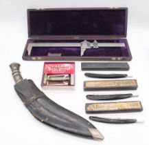 A mixed lot to include: a 1960's Indian ceremonial kukri knife with scabbard.  A Brown and Sharpe