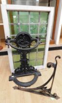 Early 20th century cast iron stick stand, 19th century cast iron hanging bracket and green stained