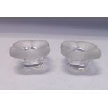 A pair of small flower shaped Lalique style frosted glass candle holders, Both unmarked. Each