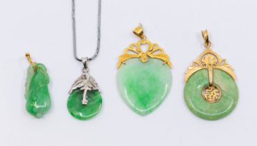 A collection of Chinese jade jewellery to include a Huaigu pendant with pierced gold Chinse