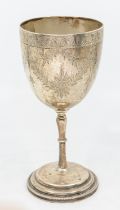A Victorian silver large goblet, bright cut engraved with trailing foliage, hallmarked by Henry