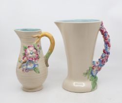 Two post 1940 Newport pottery water jugs, larger one with Clarice Cliff mark to base, cream ground