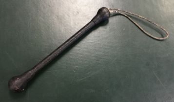 A late 19th / early 20th century cosh. Of unusual form, with a ridged shaft and flattened ball