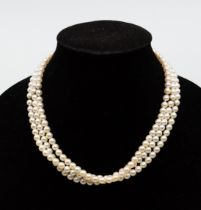 A cultured pearl and 9ct gold multi strand collarette necklace, comprising three rows of uniform