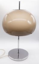 A mid 20th century table lamp in the manner of Harvey Guzzini for Meblo, with an acrylic shade on