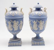 A pair of 19th Century Wedgewood Jasper twin handles lidded vases on square bases, classical detail,