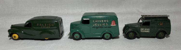 Dinky: A collection of three assorted unboxed Dinky Toys vehicles to include: Austin Raleigh Cycles,
