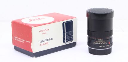 Leica: A boxed Leitz Wetzlar lens, Elmarit-R 1:2.8, 135mm, Serial Number 2154984. Original box.