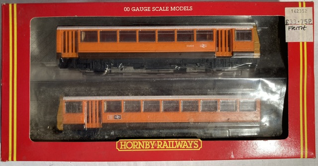 Hornby: A boxed Hornby Railways, OO Gauge, Pacer Twin Railbus Greater Manchester PTE, R297. Original