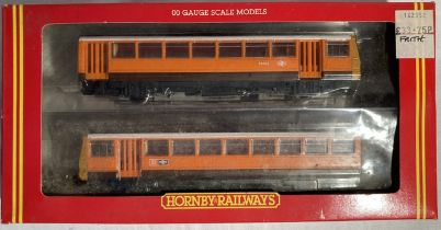 Hornby: A boxed Hornby Railways, OO Gauge, Pacer Twin Railbus Greater Manchester PTE, R297. Original