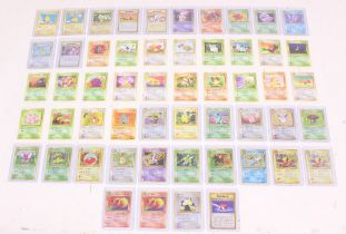 Pokemon: A collection of assorted Japanese Pokemon / Pocket Monsters cards to include: six Team