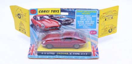 Corgi: A boxed Corgi Toys, 4.2 Jaguar 'E' Type 2+2, Reference No. 335. Original wing-carded window