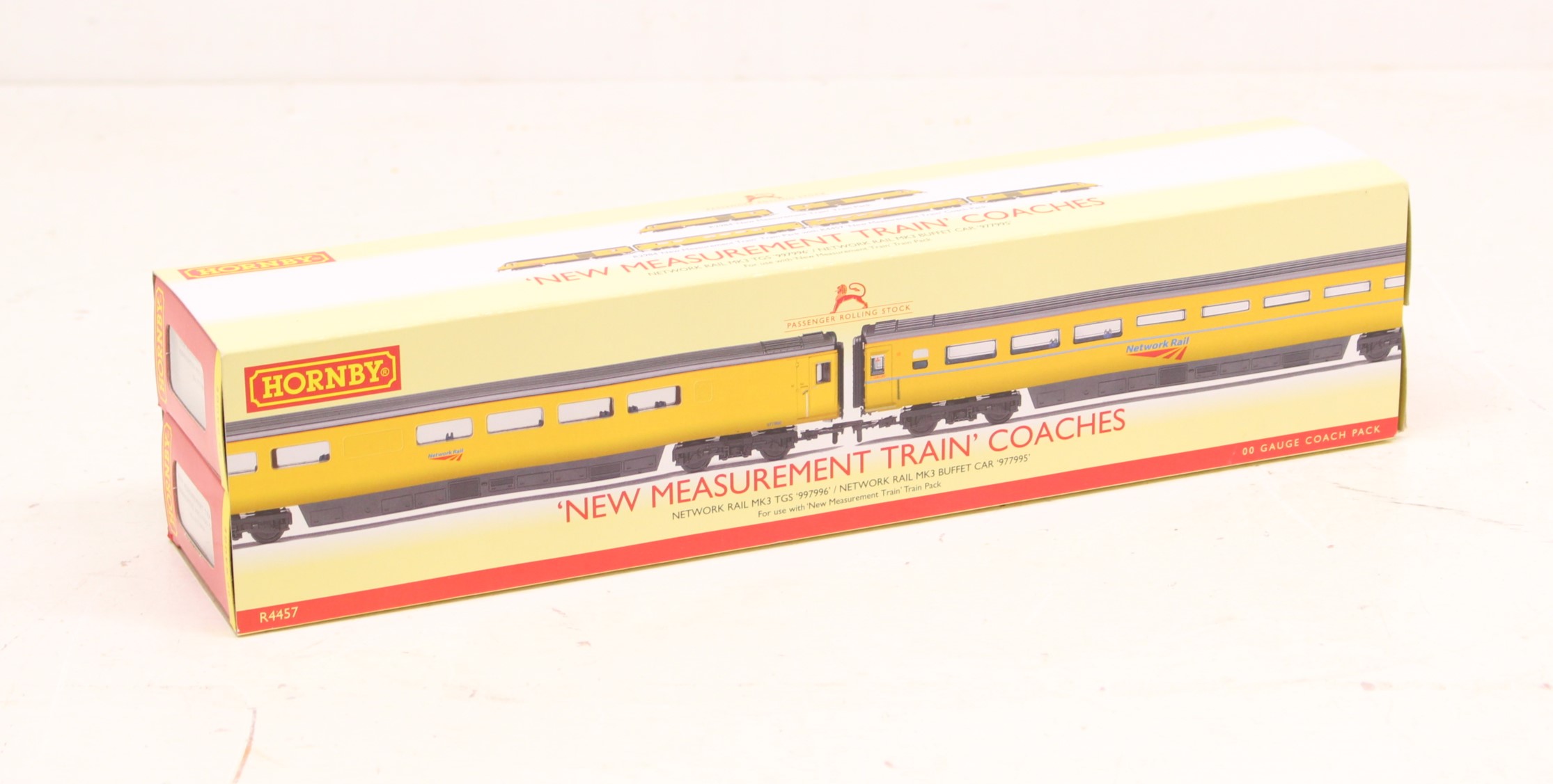 Hornby: A boxed Hornby Railways, OO Gauge, 'New Measurement Train' Coaches, Reference R4457.