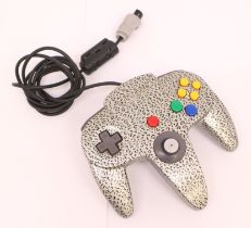 Nintendo: A Nintendo 64 Foxdata Silver Leopard wired controller. A rare example of this item as