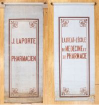 Advertising: A pair of early 20th century, French, canvas, advertising / business, roll-up signs,