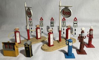 Dinky: A pair of unboxed Dinky Esso forecourt Petrol Pump island sets, together with additional