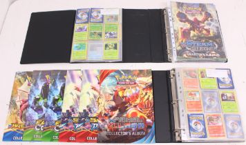 Pokemon: Two binders of assorted Pokemon cards, mostly non-holographic cards, including: Steam