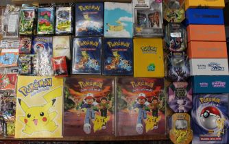 Pokemon: A collection of assorted empty Pokemon binders, together with a collection of assorted