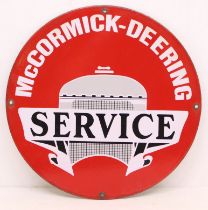 Advertising: A McCormick-Deering Service enamel circular advertising sign. Measuring approx. 30cm