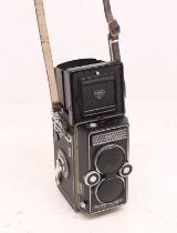 Rollei Magic: A Franke & Heidecke Rollei Magic twin-lens camera, with original case, Serial Number