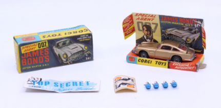 Corgi: A boxed Corgi Toys, James Bond 007 Aston Martin, Reference No. 261. Original box with display