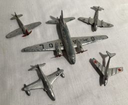 Dinky: A collection of five Dinky Aircraft vehicles to include: Viking, Tempest ll (damaged